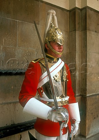 Trooper in the uniform of the Household Cavalry on   guard at Horseguards Parade Whitehall London