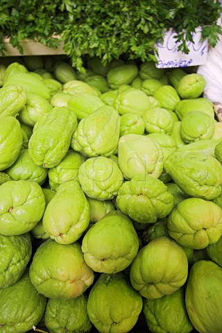 Display of chow chow fruits on a market stall at the   Mercado dos Lavradores Funchal Madeira Portugal