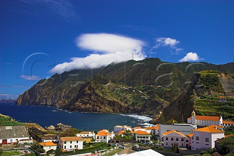 Vineyards clinging to the steep hillsides   overlooking Porto da Cruz Madeira Portugal