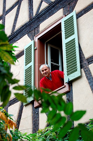 Jean Meyer of Josmeyer at the window of   his new premises in Turckheim Alsace HautRhin   France