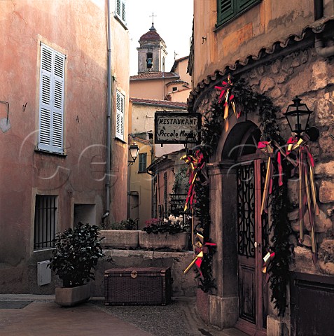 Restaurant door with Christmas decorations   Roquebrune  Provence France