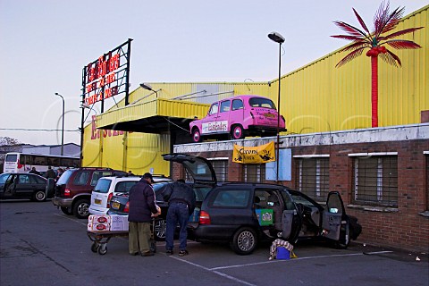 British shoppers loading wine and beer into their   car outside one of the many wine supermarkets in   Calais  NordPasdeCalais France
