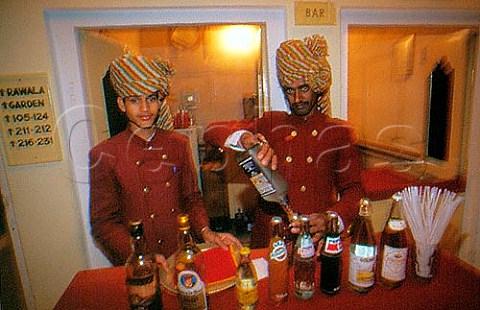 Serving drinks in the old maharajahs   mansion in Rajasthan India