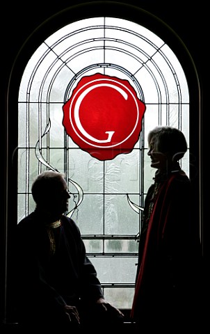 Dick and Ann Grace in cellar of Grace Family  Vineyards St Helena Napa Valley California