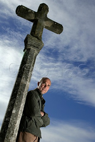 Aubert de Villaine by the cross at the foot of   RomaneConti vineyard Domaine de la RomaneConti   VosneRomane Cte dOr France