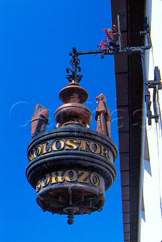 Beerhall sign with devil and monk   statues Tihany Lake Balaton Hungary