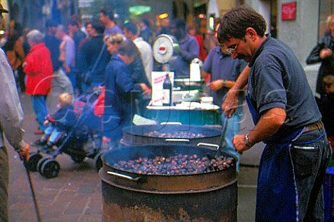 Roast chestnut seller Piazza Erbe   Bolzano Alto Adige Italy