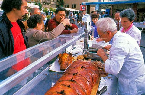 Selling roast pig at a market stall  GreveinChianti Tuscany Italy