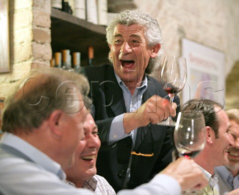 Domenico Clerico winemaker in Monforte dAlba celebrates with other producers at a Barbaresco tasting at Bottega dei 4 Vini in the village of Neive Piedmont Italy