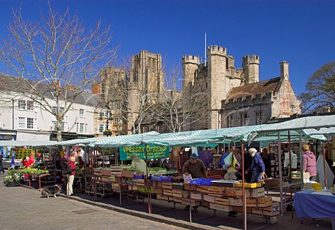 Market day in the City of Wells with the Cathedral   behind  Somerset England