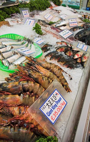 Sign in Japanese and English on the seafood and fish  stall at Oriental City Colingdale London