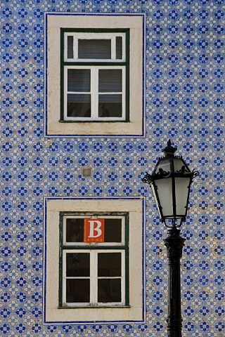 Traditional azulejos blue tiles surrounding windows   in Chiado quarter Lisbon Portugal