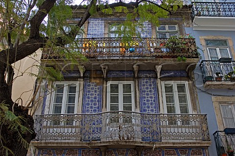 Traditional azulejos blue tiles surrounding windows   in Chiado quarter Lisbon Portugal