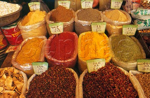 Spices on sale in a food market   western China