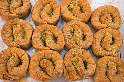 Turkish baklava desserts on sale at the French  Market WaltononThames Surrey England