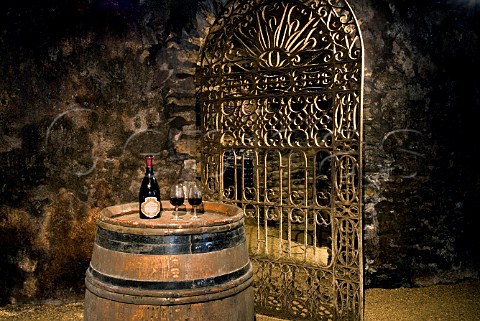 Tasting in the ancient cellar of Chteau de Pommard with its 300year old wrought iron gate Cte dOr France  Cte de Beaune