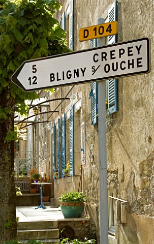 Road sign and typical French house Bouilland Cte   dOr France