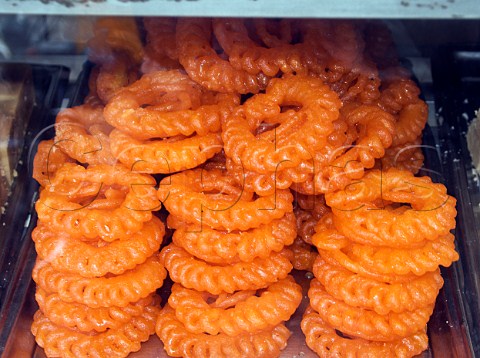 Indian sweets Jalebis for sale Chennai Madras   India  Deep fried syrupsoaked batter
