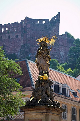 Statue of Madonna and Child in the Kornmarkt with   Heidelberg castle beyond  Heidelberg   BadenWrttemberg Germany