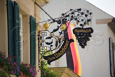 Wrought iron sign and German flag outside a wine   shop Forst Germany  Pfalz