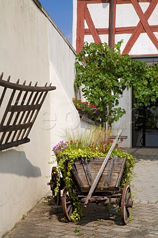 Decorative cart in the courtyard of Weingut Geheimer   Rat Dr von BassermannJordan Deidesheim Germany    Pfalz