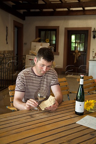 KlausPeter Keller winemaker and manager with a   sample of limestone from his vineyard Weingut   Keller FlorsheimDalsheim Germany  Rheinhessen