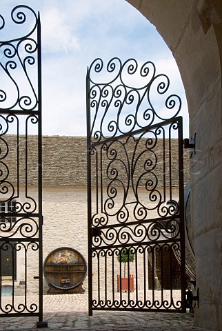 Ornate wrought iron gates lead to the courtyard of   Chteau de Pommard Cte dOr France     Cte de   Beaune