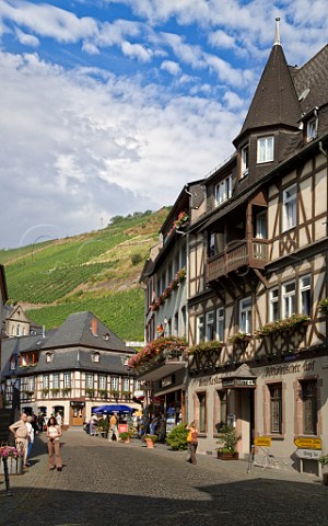 Woodframed buildings in Bacharach with Wolfshhle   vineyard behind Germany Mittelrhein