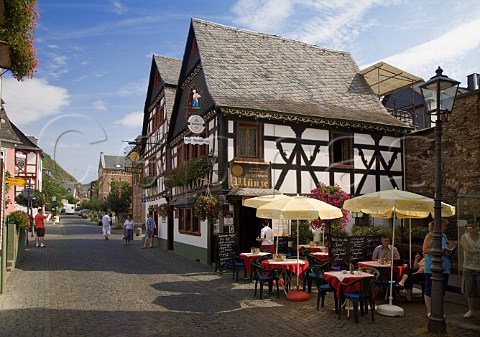 Terrace tables outside a woodframed caf    restaurant building in Bacharach Germany   Mittelrhein
