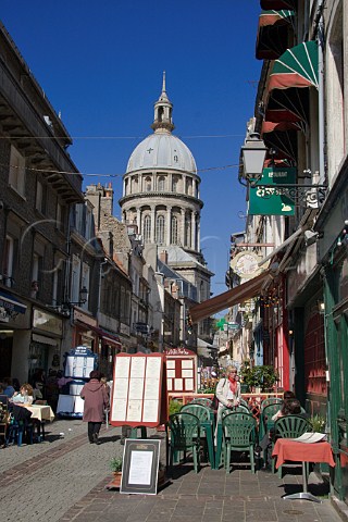 Terrace tables outside the many cafs and   restaurants on Rue de Lille in the old quarter of   Boulogne PasdeCalais France