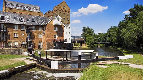 Old mill buildings at Coxs Lock on the River Wey   Navigation canal Addlestone Surrey England