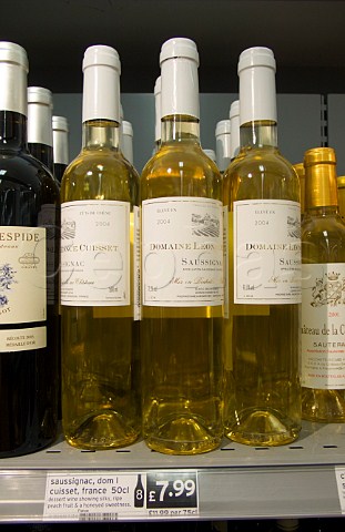 Bottles of Domaine Lonce Cuisset wine on sale in a   UK supermarket with sweetdry grading shelfedge   labels