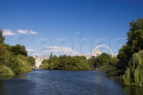 Horse Guards and the London Eye observation wheel   seen across St Jamess Park London