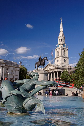 Fountains in Trafalgar Square with the spire of St   MartinsintheFields behind London