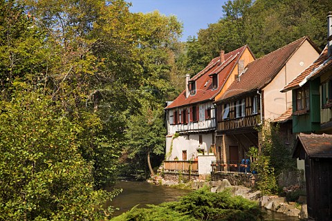 Half timbered buildings by the river Kaysersberg   HautRhin France  Alsace
