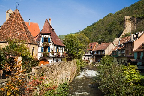 Half timbered buildings by the river Kaysersberg   HautRhin France  Alsace