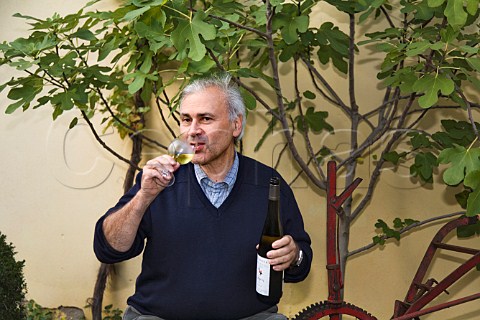 Jean Meyer of Domaine Josmeyer with a bottle of his   Hengst Riesling wine Wintzenheim HautRhin France   Alsace