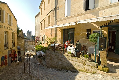 Alfresco dining on sunny terrace of the Logis de la   Tourelle Stmilion Gironde France