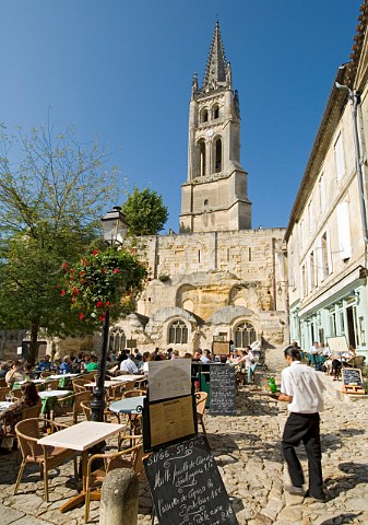 Alfresco dining on a sunny day in the main square of   Stmilion Gironde France