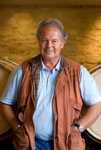 Doctor Alain Raynaud in barrel cellar of Chteau   Quinault LEnclos Libourne Gironde France    Saintmilion  Bordeaux