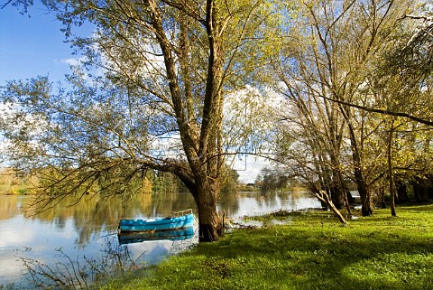Dordogne river scene with fishing boat   CastillonlaBataille Gironde France