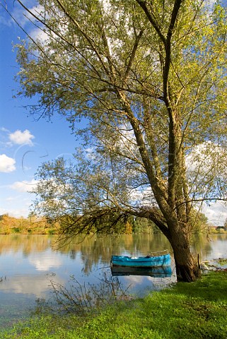 Dordogne river scene with fishing boat near   CastillonlaBataille Gironde France