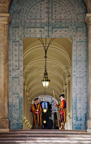 Papal Swiss Guards in traditional uniform at the Prefettura Pontificia St Peters basilica Vatican City Rome Italy