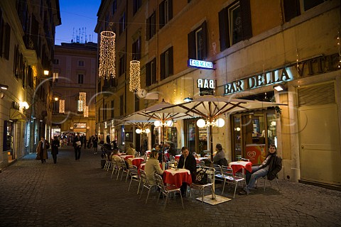 Alfresco seating outside a small caf in Via Della Condotti Rome Italy
