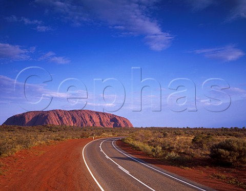 Road to Uluru in late afternoon Uluru  KataTjuta National park Northern Territory Australia