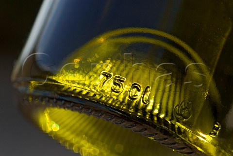 Close up on 75cl glass relief engraving on bottom of wine bottle