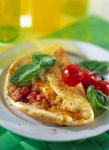 Bacon omelette with cherry tomatoes