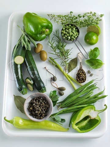 Assorted green vegetables on a tray