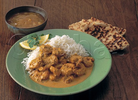 Prawn curry with rice and naan bread