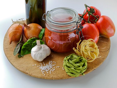Basic ingredients for tomato sauce on pasta